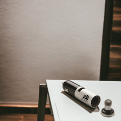 XD Car Charger with Integrated Wireless Earbud